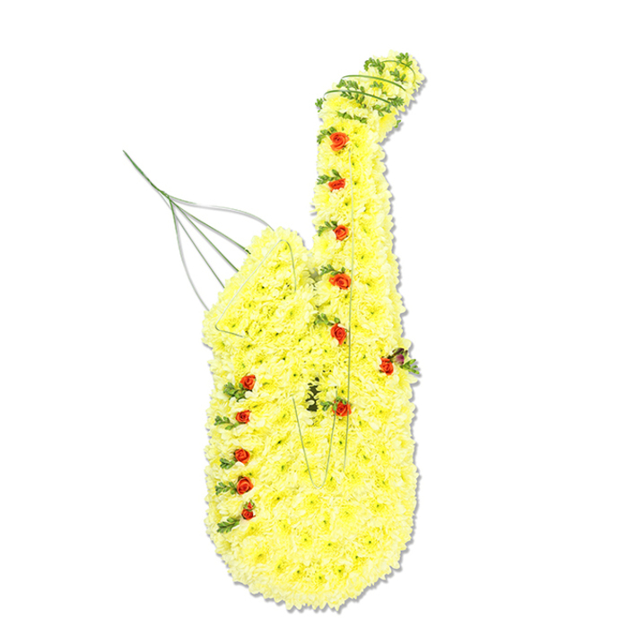 A highly detailed floral sculpture in the shape of a saxophone commands attention against a stark white background, allowing every petal and curve to stand out clearly. The body of the instrument, from the gently arching neck down to the bold bell at the base, is completely covered in small, bright yellow chrysanthemum heads that have been meticulously placed to form a continuous, textured surface. Their vivid, sunshine colour radiates warmth and positivity, providing a vibrant contrast to the sombre nature of a funeral setting. Interspersed among these chrysanthemums, deep red rosebuds are dotted along the length of the design in a pattern that echoes the keys and buttons of a real saxophone, their velvety petals and rounded shape adding both visual interest and a hint of romance and devotion. Delicate strands of green trailing foliage weave in and out between the blooms, most visible around the sweeping neck and along the base where the bell flares out, softening the edges and lending the design a natural sense of movement. Around the mouthpiece area, a few thin, slightly curved metal or green wires extend upwards and outwards, acting as both structural supports and subtle decorative lines that complete the outline of the floral instrument. This bespoke tribute would feel especially meaningful at a service in Stanmore for a musician, band member, or dedicated music enthusiast whose life touched local venues, school concerts, or community events across HA7. It offers a thoughtful way to reflect individual personality, evoking memories of favourite songs, late-night performances, and shared moments that still resonate among family and friends.