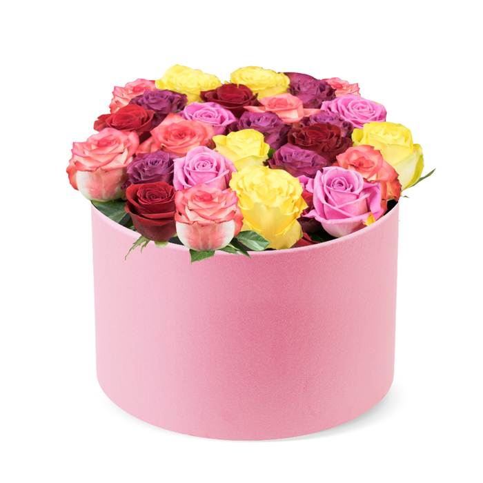 A stunning, luxurious floral arrangement fills a soft pink, round hat box, presented against a clean white background. The cylindrical box, crafted from a soft velvet or felt-like material in a delicate pastel pink shade, features a slightly curved top edge that elegantly reveals a dense display of vibrant roses. Approximately thirty to forty individual rose blooms are meticulously arranged, creating a lush, domed centerpiece that overflows from the box. The fresh roses showcase a rich tapestry of colors: cheerful bright yellow, romantic deep red and rich burgundy, various shades of pink ranging from soft blush to vibrant fuchsia and multi-toned petals with hints of cream, and opulent purple-plum hues. Each rose appears perfectly bloomed, with healthy, tightly packed petals, indicating peak freshness and premium quality. A few vibrant green leaves are visible peeking between the full blossoms, adding a natural touch of freshness and contrast. This elegant rose box embodies premium flower delivery and makes an ideal gift for special occasions such as Valentines Day, anniversaries, birthdays, Mothers Day, or just to brighten someone's day. Its exquisite design and diverse color palette suggest themes of love, celebration, beauty, and sophisticated home decor, making it a perfect visual for articles on luxury gifts, floral trends, special occasion bouquets, or tips for choosing the perfect flower arrangement.
Delivered by a Stanmore based studio florist, this piece harmonizes classic romance with contemporary refinement. The pale pink container, the dense domed rose cluster, and the restrained greenery speak of thoughtful curation and skilled hands. It is a statement piece that suits Valentines Day declarations, anniversary surprises, or a keepsake gift for someone dear. In Stanmore and across NW London, it can be available for same-day delivery, arriving in immaculate condition to grace a dining table, coffee table, or bedside decor. The image invites readers to imagine that soft morning light catching the satin sheen of the box, the velvet texture of the lid, and the jewel-toned petals catching every reflection. A refined choice for magazines, gift guides, or features on premium flower delivery, this arrangement demonstrates how color, form, and craft collaborate to conjure joy and elegance.