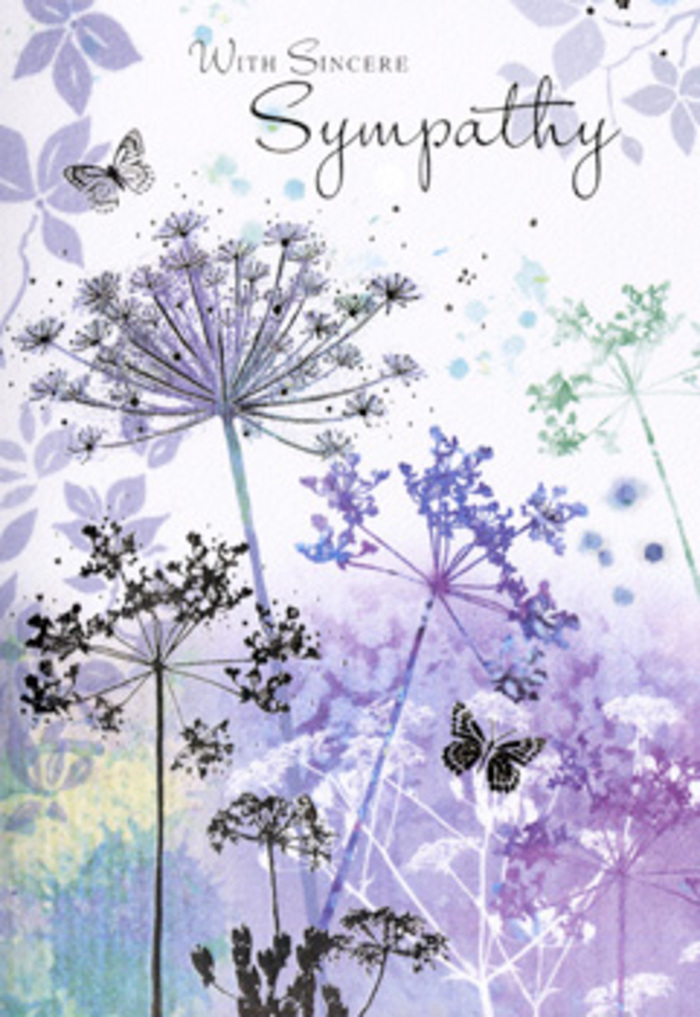There is a quiet, contemplative beauty in this sympathy card's design, reminiscent of looking out across Stanmore's open spaces under a soft, clouded sky. The central focus is a cluster of tall, slender wildflowers, their stems rising with unhurried grace from the base of the image. Each stem branches into a series of fine, radiating lines, forming umbelliferous flower heads that resemble tiny, lace-like umbrellas. These blooms are shaded in a symphony of cool tones-muted violets, soft blues, and tinges of lavender-gently overlaid with hints of silvery green. Rather than being outlined sharply, the forms appear slightly softened, as if viewed through a gentle haze, allowing the background colours to breathe through the floral silhouettes. Behind them, the card is washed in blended watercolour tones of pale purple and misted green-grey, evoking the feel of distant trees and meadows softened by early morning light near Stanmore Common. A pair of butterflies hovers above and between the blossoms, their wings delicately tinted in translucent lavender and pastel blue, adding a sense of continuity and hope without disturbing the calm. The light in the scene is even and soothing, with no bright highlights, just a steady glow that invites reflection. As a local florist at Flower Delivery Stanmore, often entrusted with creating sympathy arrangements and funeral flowers, I see how this design mirrors the emotions of remembrance: a balance of sorrow, tenderness, and gentle reassurance. It offers more than an image; it feels like an invitation to pause, breathe, and hold close the memory of a loved one in a moment of stillness.