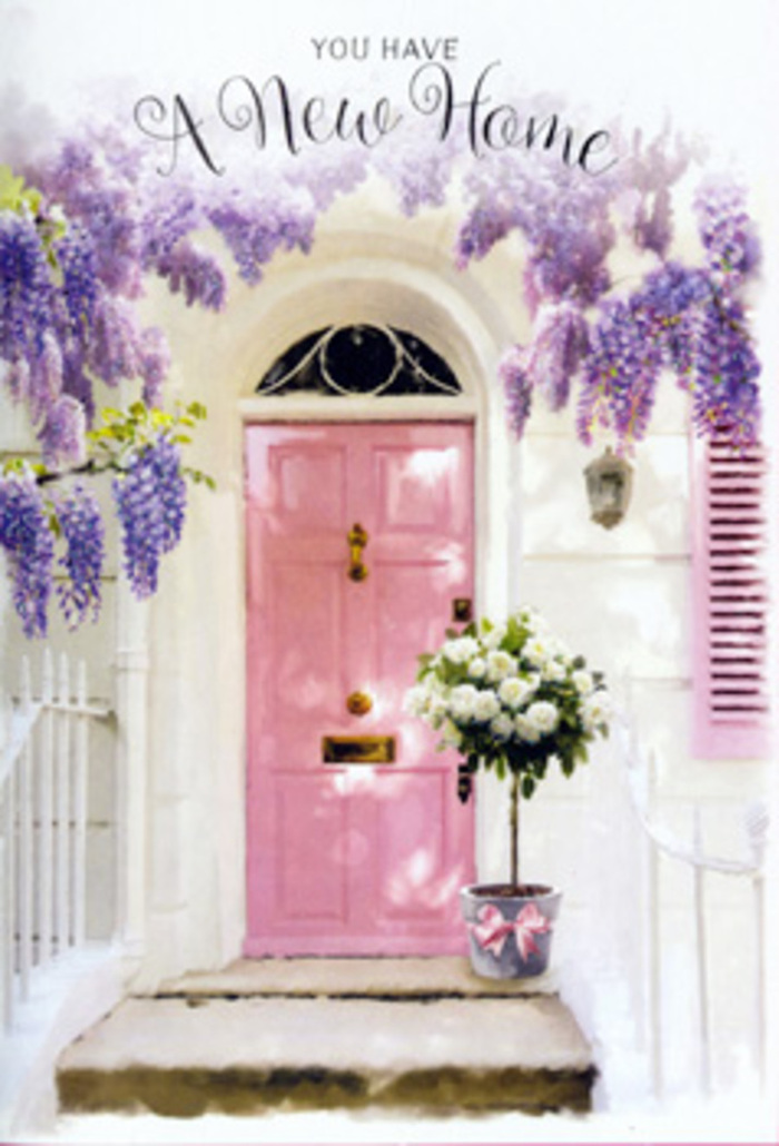 The scene here feels like a still moment in Stanmore, where tranquil streets and well-kept gardens meet the quiet excitement of starting over in a new home. A pastel pink front door commands the centre, its tone soft and powdery, more whisper than shout. The surrounding walls are whitewashed, lending a clean, bright frame that accentuates the door's gentle colour. A single shutter, painted in a slightly softened hue, offers a visual echo and catches the ambient light, creating subtle shadows that add depth to the façade. Cascading above, wisteria hangs in luxurious sweeps of lavender and light purple, the clusters of blossoms forming natural garlands that drape around the doorway. Their imagined fragrance is sweet and calming, conjuring thoughts of warm spring days in nearby parks and tree-lined avenues. Anchoring the composition at ground level, a sturdy grey metal bucket has been placed squarely in front of the threshold. Inside, a bouquet of white and cream roses is arranged with the precision of an experienced florist from Flower Delivery Stanmore. Each rose is full and plush, petals unfolding in soft spirals that give a sense of abundance and grace. Between the blooms, green foliage threads lightly, adding texture and contrast without overwhelming the delicate palette. A satin pink ribbon embraces the bucket, its bow tied in a way that feels effortless yet intentional, with the ends curling gently along the step. Together, the elements-pastel tones, cascading wisteria, and velvety roses-create an atmosphere of quiet joy and reassurance. It's the kind of floral vignette you might find waiting at a new doorstep off Spur Road or near Stanmore Station, perfectly capturing the emotions of a housewarming gift: hope, congratulations, and the soft certainty that this place is meant to be home.