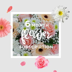 This image shows an elegant hand-tied bouquet composed of soft pink roses, peachy blush gerberas, white chrysanthemums, and clouds of gypsophila, crafted with the quiet assurance of a local Stanmore florist. The roses, in shades of powder and blush pink, are tightly cupped at the centre, their velvety petals stacking in delicate layers that create a focal point of romance and warmth. Surrounding them, gerbera daisies in pale peach and creamy blush reach outward, each bloom a neat, round disk framed by smooth, elongated petals that feel almost silk-like. Between these larger faces, fine stems of gypsophila weave through the bouquet, scattering clusters of tiny white flowers that soften the overall look, like a light mist settling on a garden at dawn. White chrysanthemums add substance and texture, their many slender petals building into rounded, cushiony blooms that suggest freshness and calm. The bouquet is shaped into a gentle dome, with blooms arranged at slightly different heights so the eye travels naturally from one flower to the next. The greens are carefully tucked in, offering a fresh frame without shifting focus from the pastel colours. The light in the photograph is soft and even, much like daylight slipping through a window overlooking Stanmore's quiet residential streets or the gentle slopes near Stanmore Golf Club, casting subtle shadows that give depth to each petal. This arrangement feels ideal for ongoing subscription deliveries-six months of seasonal comfort and beauty arriving at doorsteps from Canons Park to Stanmore Hill-perfect for brightening kitchen tables, home offices, or bedside corners with a continuous, soothing presence of flowers.