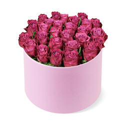 As a local florist in Stanmore, I designed this piece to feel both lush and intimate. Dozens of roses-deep fuchsia with magenta undertones-are packed tightly into a round hat box, their petals arranged to create a lush dome that fills the opening with colour. The petals wear a gradient from lighter pink near the heart to richer, berry tones at the edges, and the few wisps of dark green foliage only anchor the bloom, allowing the roses' velvet surface to glow. The box's pale pink, velvet-like finish complements the flowers without competing with them, while the slightly elevated viewpoint emphasizes the bouquet's fullness against the bright white studio backdrop.

I imagine this arrangement arriving for a milestone celebration or a romantic gesture, as if carefully chosen by a Stanmore resident who values both craft and sentiment. It would suit a dining table, a sofa-side centerpiece, or a gift to a loved one in a leafy neighbourhood near Canons Park, Belmont, or Stanmore Place. We offer same-day delivery across Stanmore and nearby NW London postcodes, with the box standing as a stand-out statement of luxury and tenderness. The composition's restrained greenery, the box's understated elegance, and the roses' saturated colour combine to convey warmth, devotion, and timeless sophistication.

Speaking of Stanmore, I picture this bloom arriving at a doorstep near Canons Park after a long day, its fragrance lifting the room and inviting a moment of quiet celebration. The hat box becomes part of the decor, a chic display that invites guests to pause and notice the craftsmanship-the careful spacing of petals, the subtle gradient from blush to magenta, the way the box's smooth surface catches the light. It is a gift that respects tradition while embracing contemporary style, a reminder that luxury can feel intimate and personal, even in a busy NW London neighbourhood.