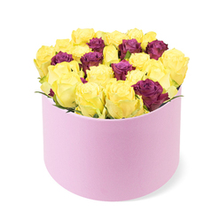 From a sunlit workshop near Stanmore High Street, this round box arrangement is a study in contrast and harmony. Cheerful yellow roses nestle among deep purple burgundy roses, all arranged inside a pale pink round box with a soft suede-like texture. The yellow blooms radiate bright energy and a hint of lemony freshness, while the purple blooms bring depth and a touch of mystery, their petals curling into tidy rosettes that catch the light. The box is densely packed for maximum impact, yet the composition remains balanced, with each stem placed with deliberate care. The pink container feels sumptuous to the touch, elevating the gift with a sense of luxe. Fresh stems are trimmed at dawn, wrapped in tissue, and tucked into a travel sleeve to arrive pristine. The overall effect is plush, celebratory, and perfectly suited to milestone moments or simply brightening a friend's day in Stanmore. This piece reflects the craft and thought of a local florist who serves Stanmore, Canons Park, and nearby streets, with reliable same-day delivery that brings fresh, local blooms to homes and businesses alike. Expect a gentle, fresh scent as the lid is lifted, a moment of warmth that mirrors the neighbourhood's friendly spirit.
