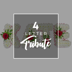 In this image, a personalised four-letter floral tribute is presented with quiet elegance, echoing the calm, tree-lined streets of Stanmore. The background is a soft, uniform light grey that gently recedes, drawing attention towards the centre where a dark, semi-transparent grey square is framed with a fine white border. On this central panel, the phrase "4 LETTER Tribute" appears in bright white: "4 LETTER" in a clean sans-serif style, while "Tribute" curls gracefully underneath in a script font, much like a personal signature on a sympathy card. Through the slightly veiled square, four floral letters can be seen stretching out to the sides, their full shapes just visible. Each letter is blanketed in pristine white chrysanthemums, arranged so tightly that they form a continuous, cushiony surface, the petals layered like soft feathers. Around the sides of the letters runs a faint edging of blush-pink ribbon, adding a delicate halo of colour that feels tender and reassuring. Here and there, vivid red roses are worked into the chrysanthemum base, accompanied by lush green foliage that spills naturally between the blooms, as you might see in tributes heading to a Stanmore chapel or crematorium. The roses' deep crimson petals coil inward in tight spirals, bringing emotional intensity and symbolising love that remains steadfast even in loss. The overall look is serene and carefully balanced, combining modern typography with traditional funeral floristry. It invites the viewer to imagine any four-letter name or word-MUM, DAD, NAN, or a loved one's initials-being handcrafted in flowers to honour a life remembered within the Stanmore community.