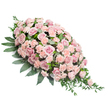 A refined pink funeral spray is displayed on a bright white background, its elongated, tapering form suggesting the traditional shape of a casket spray designed for a Stanmore memorial or church service. The top of the spray is rounded and full, layered densely with soft pink roses whose petals form intricate spirals, some blossoms opened wide and others still gently unfolding. Intertwined among these roses are plentiful light peach-pink carnations, their ruffled, multi-petalled heads giving a sense of delicate volume and softness, so that the surface of the arrangement appears almost like a plush, floral cushion. The colours shift subtly from paler blush tones to slightly deeper pinks, creating a pleasing, harmonious blend that feels soothing rather than bold. Encircling and underpinning the blooms is a frame of rich green foliage: broad, glossy leaves provide solid structure along the sides and at the rounded top, while more slender, pointed greens extend outward and downward, especially from the narrow lower right tip, creating a gentle, flowing line that leads the eye along the length of the spray. The lighting is soft and even, revealing the fine texture of each petal and the natural sheen of the leaves while maintaining a calm, respectful atmosphere. It is easy to imagine this design resting in a Stanmore chapel near Gordon Avenue, or being placed with care at a graveside overlooking the greenery of the area. The arrangement speaks quietly of sympathy, love, and remembrance, offering a tender floral presence when family and friends gather to say their final goodbyes.