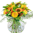 Bursting with colour and crafted with the joyful flair found in Stanmore's best flower shops, this arrangement is a celebration of nature's golden palette. Grand sunflowers, with their warm yellow petals and velvety brown centers, anchor the arrangement and draw the gaze while recalling Stanmore's sunny meadows and gardens. Yellow garden roses, their petals a soft spiral of buttery gold, snuggle in between, adding an air of classic elegance. Clusters of bright red Hypericum berries catch the light and invigorate the design, creating small moments of vibrant surprise among the lush greenery. Cascading fern fronds and sprigs of delicate fill-possibly goldenrod, with its tiny yellow blooms-add textural movement, echoing the gentle sway of trees in Stanmore Country Park. Eucalyptus leaves, in their familiar dusty blue-green, offer a modern and fragrant note. The bouquet is cradled in a bowl-shaped clear glass vase, the arrangement of fresh stems and water gleaming for all to see. A faint, uplifting scent-rose, cut grass, and the fresh promise of the outdoors-floats in the air. This composition brings an unmistakable air of celebration, perfect for gift-giving or bringing warmth into any Stanmore home. Every element speaks of the thoughtful touch and local expertise of Stanmore florists.