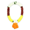 The photograph portrays an ornate artificial mala used as a funeral tribute, its colours and textures sharply defined against a smooth white backdrop. The garland is shaped into a gentle U, evoking the way such pieces are often draped around portraits or placed over memorial displays during services in Stanmore's quiet residential streets. At the top, densely arranged snow-white petals create a thick collar of softness, radiating serenity and suggesting purity of spirit. Pockets of green foliage, subtly woven into these white sections, add small hints of natural freshness without disrupting the overall calm. As the eye follows the garland downward, the white tones deepen into robust bands of reddish-brown maroon, grounding the design with a sense of respect, tradition, and the weight of farewell. These maroon stretches gradually transition into expansive clusters of yellow petals curving around the lower half, bringing a gentle brightness that feels like the promise of light after sorrow, reminiscent of sunshine breaking over the rooftops near Stanmore Hill. Within the yellow, slender stripes of white petals reappear near the base on both sides, providing a delicate bridge to the focal point. From the very bottom hangs a prominent, globe-like pendant formed entirely of vivid orange petals, echoing the form of a marigold pom, symbolising devotion and the enduring warmth of memory. Every petal throughout the garland is arranged in tight, voluminous clusters, creating a plush, textured appearance that closely resembles fresh flowers while remaining practical for long services, home vigils, and temple-style ceremonies across Stanmore where families seek a lasting, visually meaningful expression of love and remembrance.