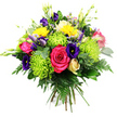 Set against a plain white background, this dense, vibrant hand-tied bouquet is shown in full, rounded form, allowing each bloom and leaf to be appreciated as part of a harmonious whole. A large hot pink rose sits prominently at the centre, its petals wide, velvety, and gently curling, drawing the focus with its bold yet romantic tone. Flanking this focal rose are generous clusters of lime green spider chrysanthemums, instantly recognisable by their narrow, elongated petals that radiate like delicate green fireworks, adding a playful texture and lively chartreuse colour. Bright yellow button-style chrysanthemums or small gerberas are scattered throughout, their compact, sunny faces bringing a burst of cheer that feels perfectly at home in a welcoming Stanmore living room. Deep indigo and violet lisianthus blooms are threaded among the brighter flowers, their soft, ruffled petals introducing depth and sophistication. From within the bouquet, slender stems of creamy white or pale yellow freesia rise gracefully, each bearing a series of small, bell-shaped flowers that arch gently and suggest a light, sweet fragrance. Tucked more discreetly inside are hints of smaller roses or spray roses in pale pink or peach, adding quiet, romantic notes. The entire composition is enveloped by a generous mix of dark green foliage: feathery fern fronds, smooth elongated leaves, and other lush greenery create a layered backdrop that enhances the colours and gives the arrangement a fresh, garden-like feel. The bouquet appears freshly crafted, the sort of thoughtful floral gift that might be delivered across Stanmore, from homes near Stanmore station to quiet residential streets off Marsh Lane, perfect for celebrations, get-well wishes, or simply brightening someone's day.