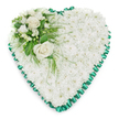 A serene heart-shaped funeral arrangement is shown against a clean white backdrop, its form clear and uncluttered. The heart's outline is emphasised by a luxurious emerald green satin ribbon, carefully folded into neat pleats that create a softly ruffled edge. This ribbon frames the floral centre like a gentle embrace, its rich green tone echoing the foliage that appears within the design. Inside, the heart is densely filled with white chrysanthemums, their many small petals overlapping to form a thick, cushion-like surface. The blooms are uniform and fresh, creating the impression of a snowy field or a soft blanket laid out in quiet tribute, evoking the peacefulness of Stanmore's green corners and tree-lined avenues. At the top left curve of the heart, a cluster of flowers and foliage draws subtle attention. Two white roses, fully opened yet perfectly formed, are the stars of this section. Their layered petals spiral outward, symbolising love and remembrance. Surrounding them are smaller white flowers and buds that bring delicate variation in shape and scale. The greenery includes broad, glossy leaves that provide depth and structure, as well as fine, feathery stems that gently trail across the chrysanthemum base, adding a sense of natural movement. The composition is carefully balanced so that the accent enhances, rather than overwhelms, the simplicity of the heart. The overall mood is one of quiet respect and heartfelt sympathy. This arrangement would be well suited to a funeral service, crematorium ceremony, or memorial gathering in the Stanmore area, offering a graceful, comforting presence during moments of farewell and reflection.