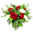 A beautifully composed bouquet of rich red roses and creamy white calla lilies sits in a clear glass vase, captured against a stark white background that lets the design's colours and lines speak for themselves. At the centre, multiple roses are fully opened, their petals velvety and deeply saturated, curling outward in tight, layered spirals to form lush, dome-shaped crimson blooms that immediately evoke passion, admiration, and enduring love. Interlaced among the roses, white calla lilies stretch upwards with quiet grace, their smooth, funnel-shaped petals folding around pale golden spadices and lending a modern, sculptural elegance that softens the drama of the red. Encircling these focal flowers is a generous halo of greenery: light, feathery branches of eucalyptus with slightly rounded blue-green leaves drift outward, adding movement and a subtle, aromatic freshness, while broader, darker green foliage anchors the base, giving the bouquet a rounded, full silhouette. The cylindrical glass vase reveals the tidy bundle of stems immersed in clear water, and a delicate ribbed detail near the base offers a small visual accent. Bright, balanced lighting washes over the arrangement, reminiscent of natural daylight in a Stanmore living room overlooking Canons Drive, emphasizing the contrast between the matte softness of the roses, the gentle sheen of the lilies, and the layered textures of the leaves. The mood is quietly luxurious and deeply romantic, ideal as an anniversary gift delivered to a home near Stanmore station, a Valentine's Day surprise for someone special around Belmont Circle, or an elegant centrepiece for a family celebration in the wider HA7 area, arranged with care by a local Stanmore florist.