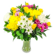 The photograph features a richly coloured bouquet of mixed flowers gathered in a clear glass vase, standing against a pristine white background that gives it a clean, contemporary feel. The arrangement is domed and compact, with blooms thoughtfully layered to create both fullness and visual rhythm, as you might expect from an experienced florist at Flower Delivery Stanmore. Bright yellow roses, their petals neatly spiralled and gently opening, share space with large yellow chrysanthemums whose tightly ruffled, spherical heads add a plush, tactile quality. Scattered among these vibrant yellow blooms are clusters of small, white daisy-like flowers highlighted by lime-green centres, bringing a fresh, meadow-like charm reminiscent of quiet corners of Stanmore's open spaces. Soft, fluffy white chrysanthemums, similar in shape to the yellow ones, contribute to the bouquet's airy, cloudlike effect, keeping the colour story bright and harmonious. Striking magenta and fuchsia chrysanthemums punctuate the design, offering vivid colour accents that draw the eye and add a festive note, while smaller, pastel pink flowers nestle between the larger blooms to introduce depth and gentle warmth. The entire arrangement is anchored and framed by lush deep green foliage, likely Ruscus, with smooth, glossy oval leaves that arch and weave through the bouquet, enhancing the colours and helping define its rounded silhouette. Through the gracefully curved sides of the glass vase, you can see tidy green stems gathered in clear water, suggesting freshness and care in preparation. The lighting is bright and even, ensuring every petal and leaf is crisply visible. The bouquet's mood is cheerful, optimistic, and welcoming - ideal for birthdays, thank-you gifts, or get-well wishes delivered across Stanmore, adding a burst of colour and life to any room.