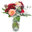 Drawing the eye with a rich contrast of velvety reds and creamy peach tones, this Stanmore bouquet feels both lavish and inviting. The focus is a graceful trio of peach-toned roses, their petals soft and warm, radiating gentle affection suitable for romantic gestures or sincere birthday surprises. Maroon chrysanthemums provide dramatic framing, their thick, ruffled blossoms adding luxurious depth and echoing the vibrant community energy found in Stanmore's local markets. Wisps of baby's breath float like tiny clouds, encircling the deeper hues with an airy luminosity that brightens the arrangement. Glossy foliage and sprigs of eucalyptus round out the bouquet, introducing a cool, herbal scent that's refreshing as a walk near Stanmore Common. The stems, arranged in a clear glass vase, create a natural, slightly wild pattern that suggests freshness and authenticity. This bouquet, with its thoughtful elegance and subtle scents, delivers a lasting impression to any home or celebration in Stanmore.
